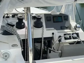 Cockpit of a 2020 Leopard 50 yacht with navigation equipment and steering wheel.