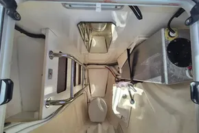 Interior of a 2021 Leopard 45 yacht, featuring a compact, well-organized engine room.