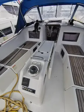 2020 Jeanneau Sun Odyssey 410 cockpit with modern navigation equipment and seating.