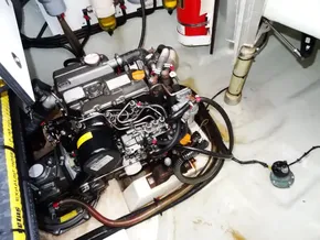 Engine compartment of a 2021 Leopard 40 catamaran, showcasing mechanical components and wiring.