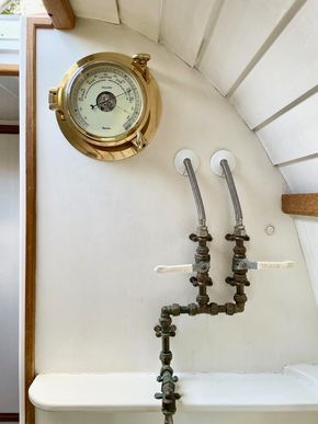 Shower/bath taps and barometer