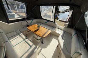 Interior of 1991 Sealine 290 Ambassador boat with seating and table.