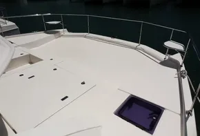 2017 Leopard 43 Powercat deck with storage compartments and railing.