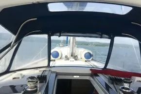 Interior view of 2013 Beneteau Oceanis 41 sailboat cockpit with ocean backdrop.