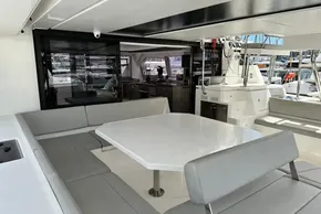 Luxurious Leopard 50 yacht interior with modern seating and dining area, 2021 model.