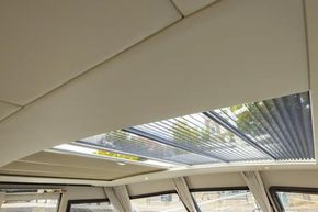 2025 Linssen 45 SL Sedan interior with panoramic sunroof and modern design.