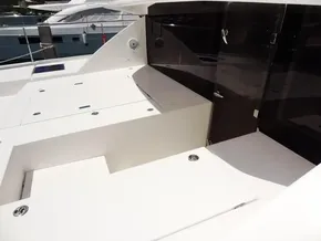 2017 Leopard 43 Powercat deck area with storage compartments and sleek design.