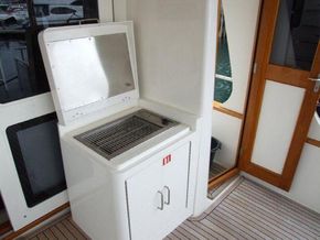 Aft deck BBQ with weather door open