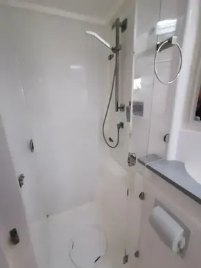 2017 Leopard 51 Powercat bathroom with modern shower and fixtures.
