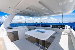 Luxurious 2025 Leopard 40 Powercat yacht interior with ocean view and modern seating area.