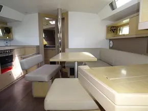 Interior of 2017 Beneteau Oceanis 45 yacht with modern seating and dining area.