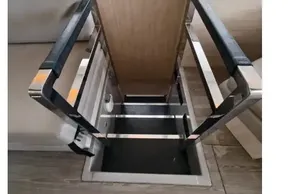 Staircase with metal railings inside a 2020 Leopard 50 yacht interior.