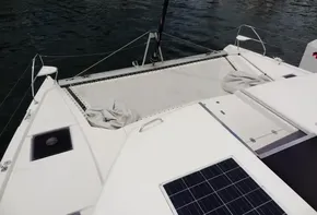 Leopard 50 catamaran 2020 model with solar panels and netting on deck.