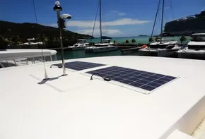 2017 Leopard 43 Powercat with solar panels docked in a marina.