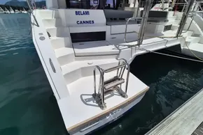 Leopard 45 catamaran docked, featuring steps and stainless steel ladder, 2021 model.