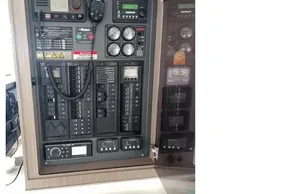 Electrical control panel inside a 2022 Leopard 45 yacht, featuring various switches and gauges.