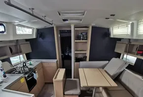 2020 Beneteau Oceanis 46.1 interior with modern kitchen and dining area.
