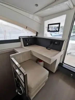 Interior helm station of 2017 Leopard 51 Powercat with modern controls and seating.