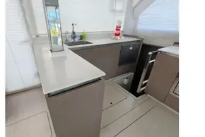 Modern kitchen interior of 2021 Leopard 50 yacht with sleek countertops and appliances.