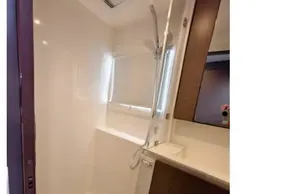 Modern shower area in 2021 Leopard 50 yacht, featuring sleek design and fixtures.