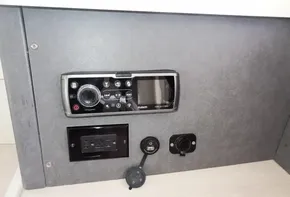 Control panel of a 2015 Leopard 51 Powercat with Fusion stereo system.