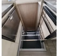 Interior of 2020 Leopard 50 yacht showing modern kitchen with stainless steel appliances.