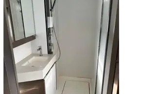 Modern bathroom interior on 2022 Leopard 53 Powercat yacht, featuring sleek design and fixtures.