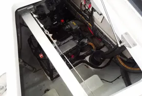Engine compartment of a 2017 Leopard 45 catamaran with visible wiring and components.