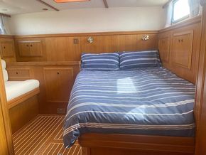 Aft cabin - looking aft, with double berth to port and seating to stbd