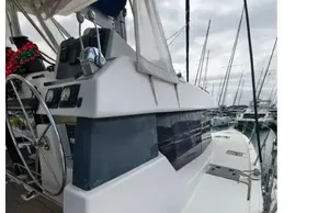 2019 Leopard 50 yacht deck with steering wheel and marina view.