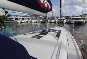 Beneteau Oceanis 46.1 2020 sailboat docked at a marina with other yachts.