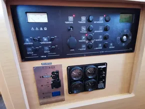 Control panel of a 2020 Lagoon 42 yacht, featuring various switches and gauges.
