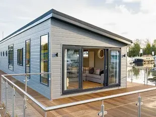 2022 Wide Beam Waterfront Living Floating Home