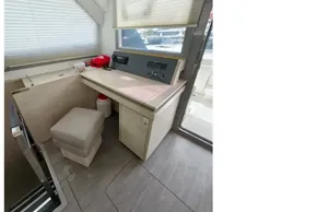 Modern yacht interior with desk and seating, Leopard 50, 2020 model.