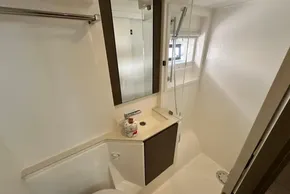 Bathroom interior of 2025 Robertson and Caine Leopard 46 Powercat, featuring modern fixtures and shower.