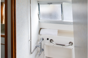 Aft toilet and shower