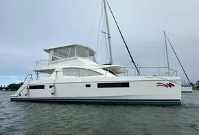 2019 Leopard 51 Powercat yacht anchored in calm waters.