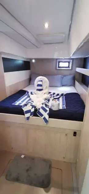 Luxurious cabin interior of 2019 Leopard 51 Powercat with neatly arranged towels.