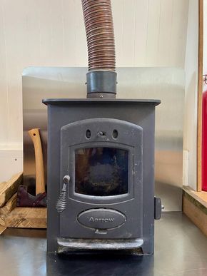 4kw woodburning stove with stainless steel surround