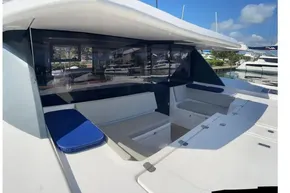 2022 Leopard 45 yacht with spacious seating area and marina view.