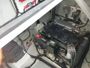Engine compartment of a 2019 Leopard 45 catamaran, showcasing mechanical components and wiring.