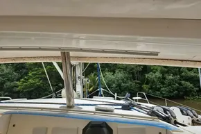 2008 Leopard 40 yacht cockpit view with lush greenery in the background.