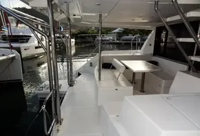 2018 Leopard 43 Powercat yacht interior with seating and dining area.