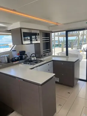 Modern kitchen on Leopard 53 Powercat 2021 with ocean view.