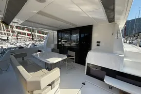 2024 Leopard 40 Powercat yacht interior with seating and dining area.