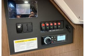 Jeanneau NC 37 twin diesel cruiser - audio controls and switch panel