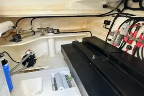 Engine room of 2022 Leopard 53 Powercat with wiring and mechanical components.