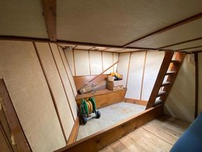 Bow storage visible from bed frame