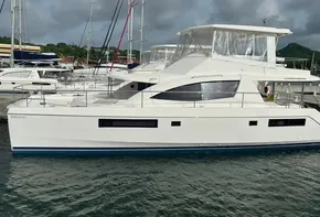 2019 Leopard 51 Powercat yacht docked in marina, side view.
