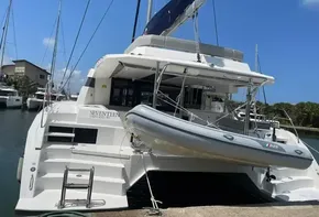 Leopard 50 catamaran yacht docked with dinghy, 2020 model.